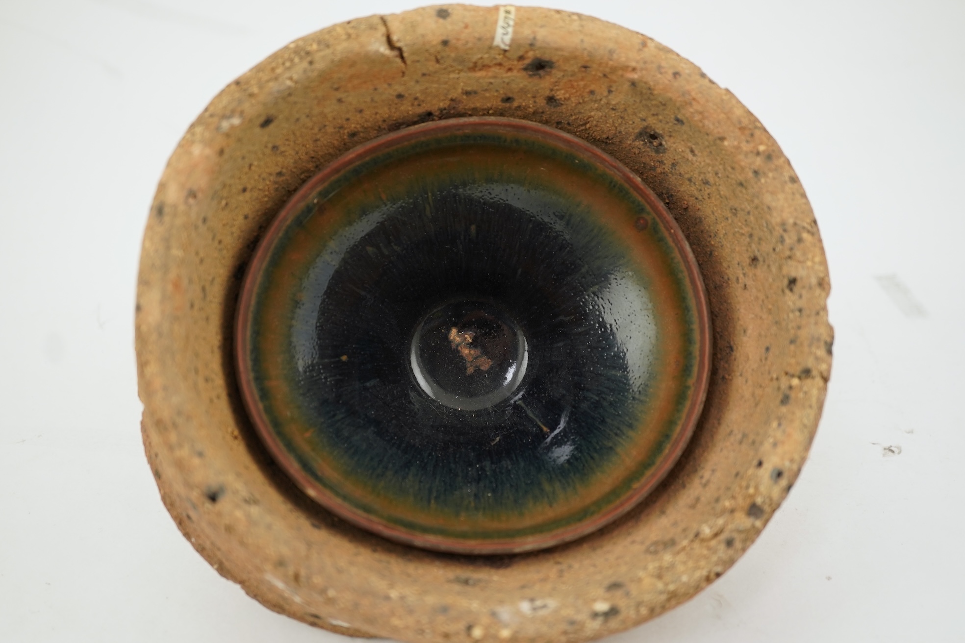 A Chinese Jian ware hare's fur bowl and saggar, Song dynasty
